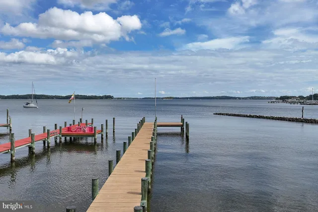 a view of roof deck with seating space and barbeque oven