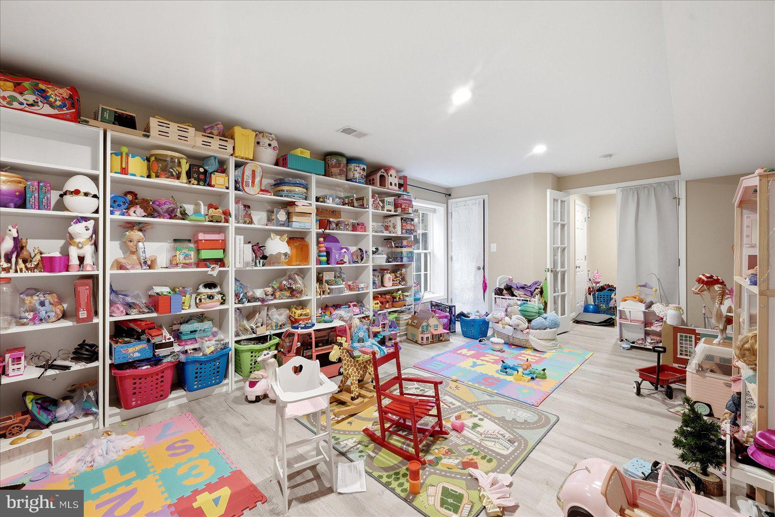 911 Riva Ridge Drive Great Falls, VA 22066 - Photo 30 of 55 Colorful playroom brimming with toys.