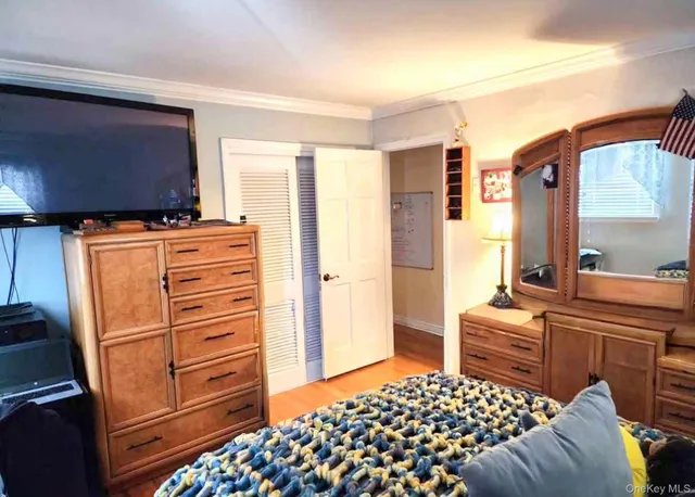 a bedroom with a bed and furniture