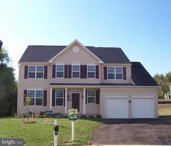 1728 Canal Clipper Court Point of Rocks, MD 21777 - Photo 1 of 5 a front view of a house with a yard and garage