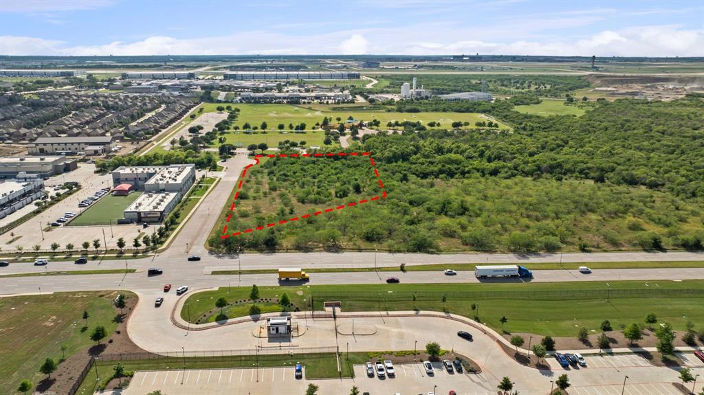 5200 North Belt Line Road Irving, TX 75038 - Photo 29 of 40 a view of a swimming pool with a yard