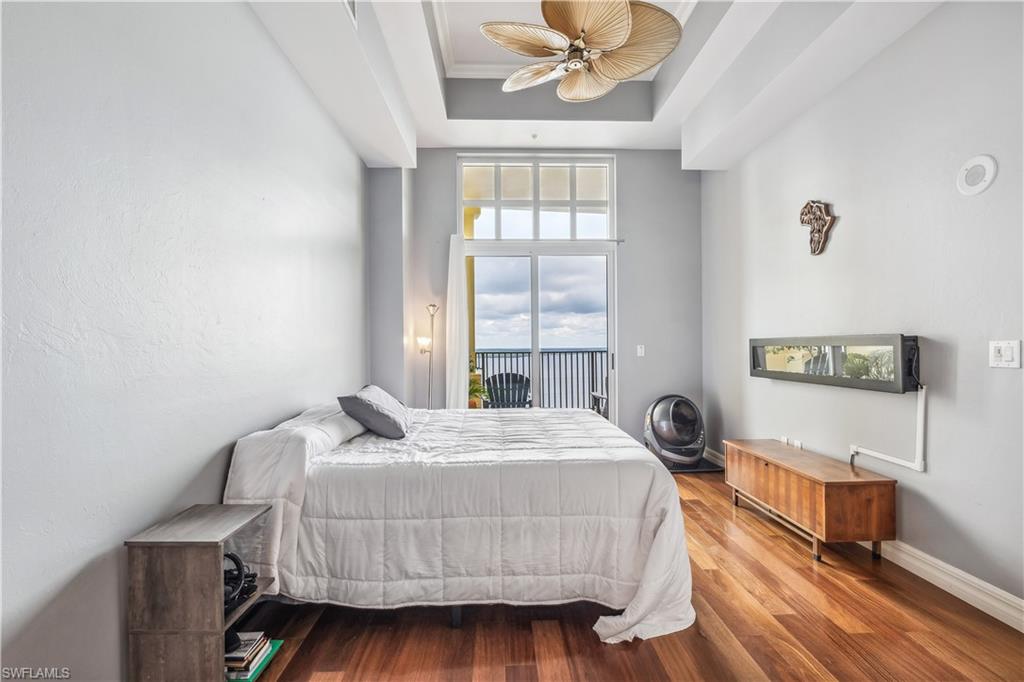 2797 First Street, Unit 2003 Fort Myers, FL 33916 - Photo 11 of 39 a bedroom with a bed and window
