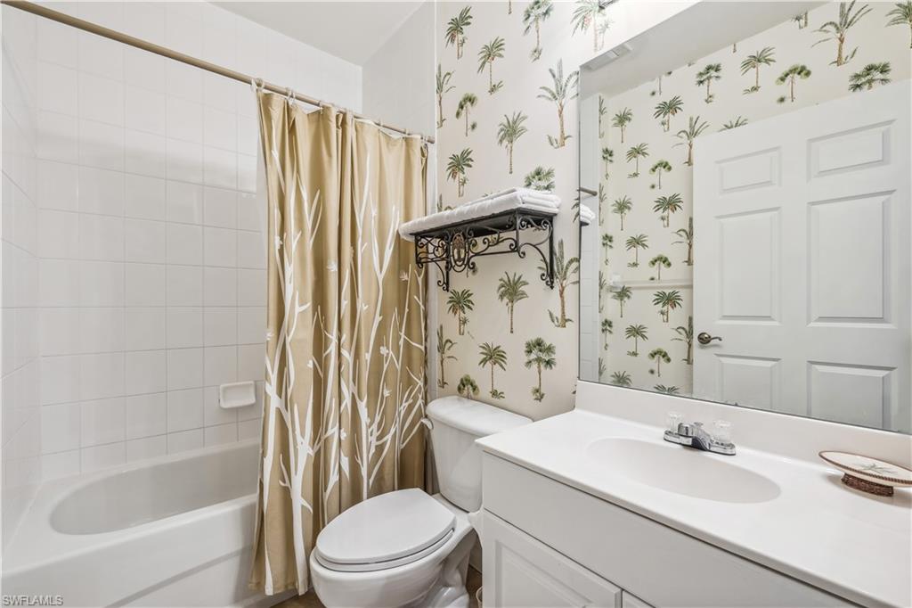 2797 First Street, Unit 2003 Fort Myers, FL 33916 - Photo 18 of 39 a bathroom with a sink toilet and shower