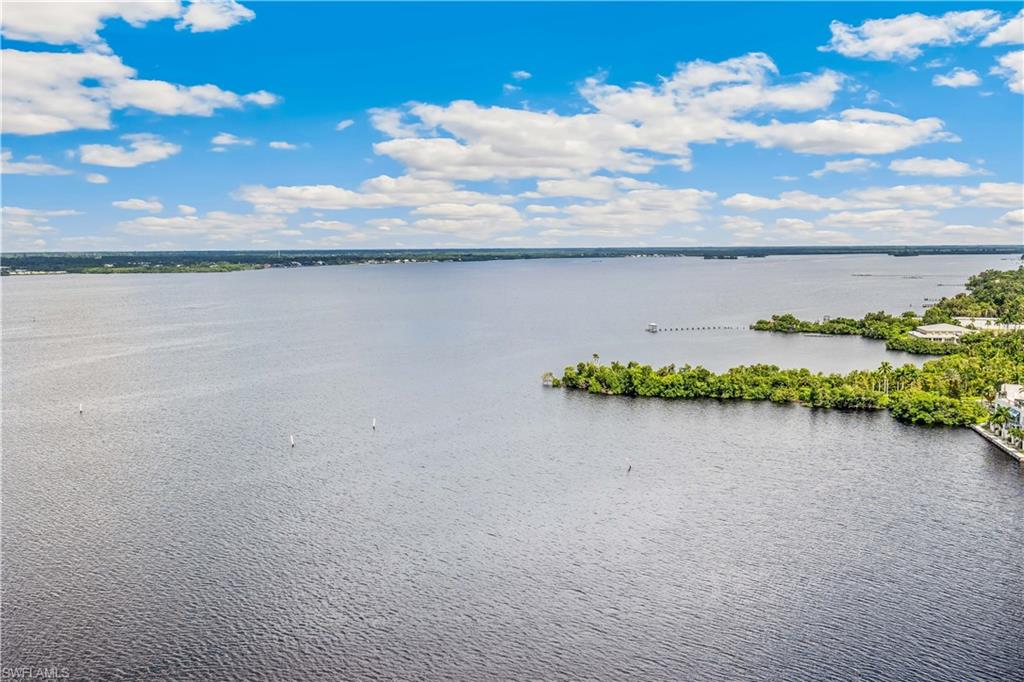 2797 First Street, Unit 2003 Fort Myers, FL 33916 - Photo 25 of 39 a view of a lake from a yard