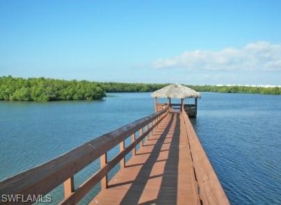 2797 First Street, Unit 2003 Fort Myers, FL 33916 - Photo 28 of 39 a view of building with lake and mountain in the back