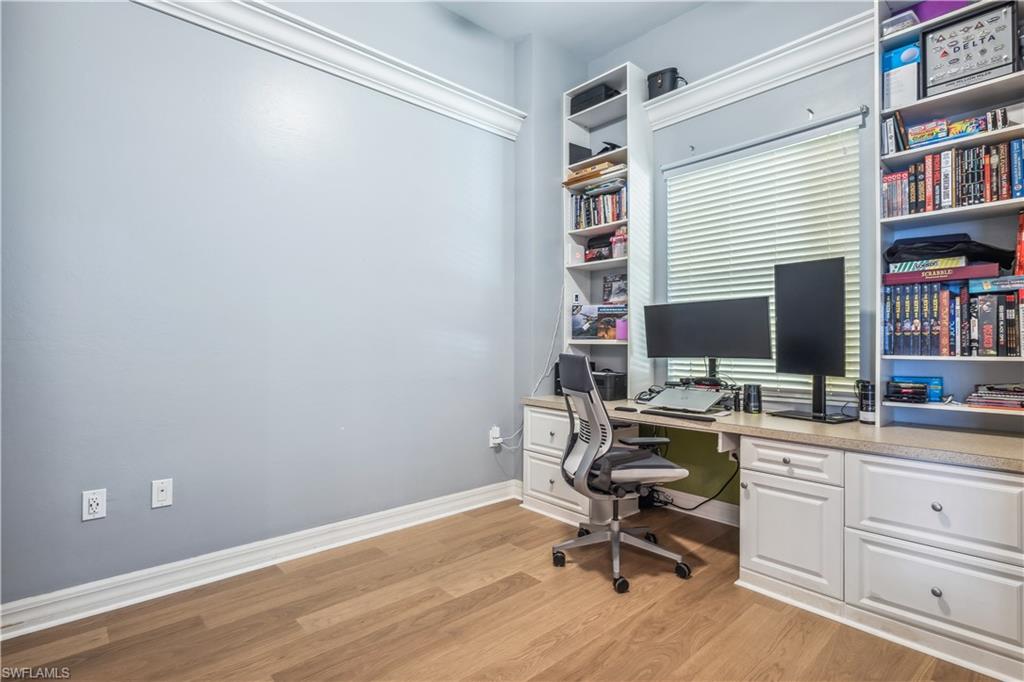 2797 First Street, Unit 2003 Fort Myers, FL 33916 - Photo 4 of 39 a view of a workspace with furniture and a window