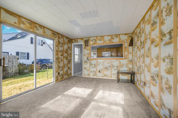 an empty room with windows