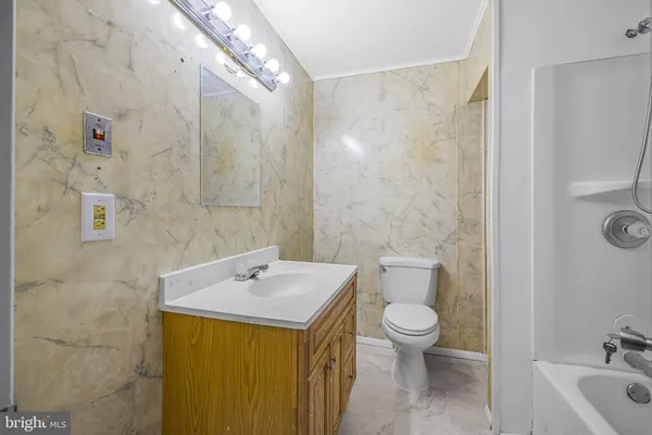 a view of a livingroom with table and chair