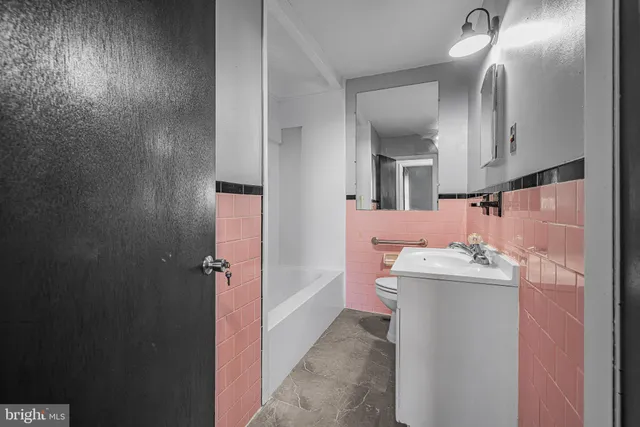 a view of a swimming pool with an outdoor space and seating area