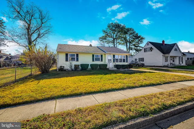 a view of a backyard with a house