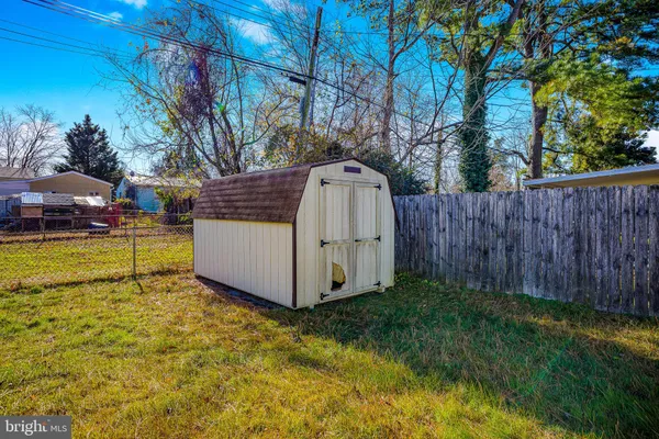 a view of a swimming pool with an outdoor space and seating area