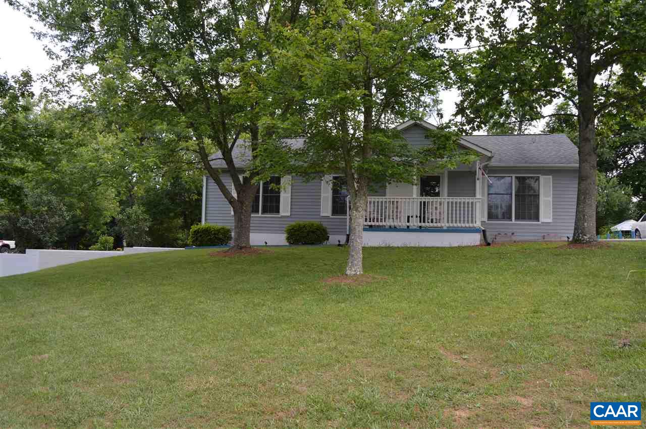 92 Rippin Run Road Ruckersville, VA 22968 - Photo 5 of 17 a front view of house with outdoor seating and yard