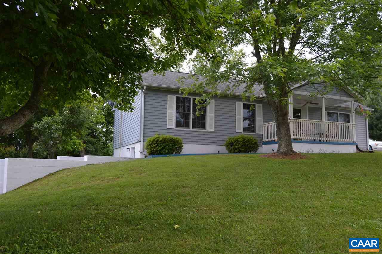 92 Rippin Run Road Ruckersville, VA 22968 - Photo 6 of 17 a view of a house with a backyard