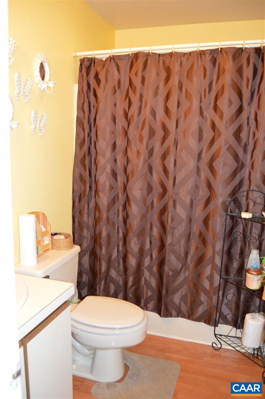 92 Rippin Run Road Ruckersville, VA 22968 - Photo 9 of 17 a bathroom with a toilet and a sink