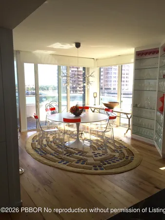 a view of walk in closet with clothes