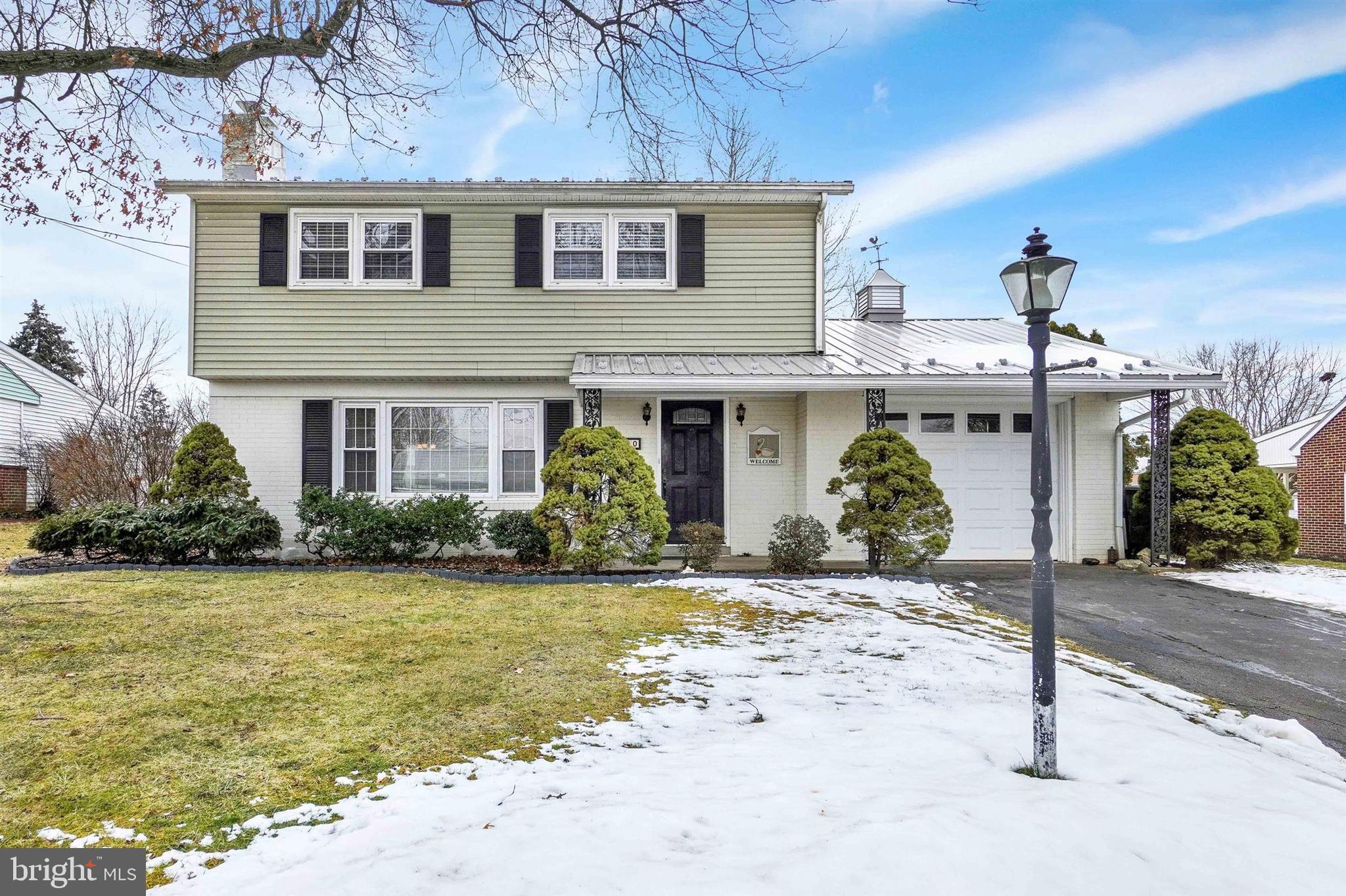 3460 Sycamore Road Dover, PA 17315 - Photo 1 of 28 a front view of a house with garden