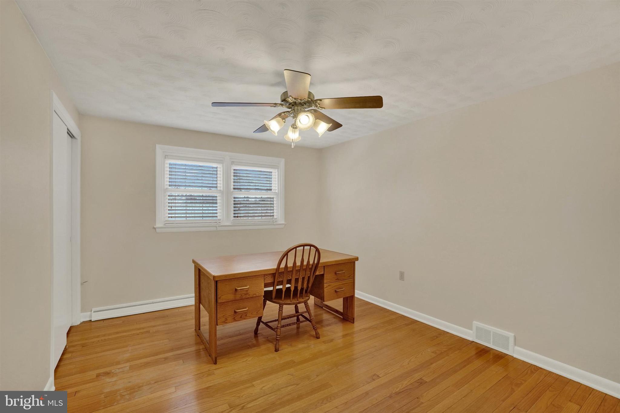 3460 Sycamore Road Dover, PA 17315 - Photo 12 of 28 a workspace with wooden floor and a window