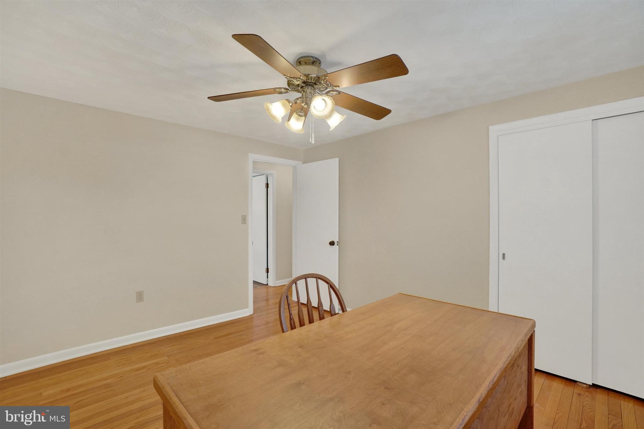 3460 Sycamore Road Dover, PA 17315 - Photo 13 of 28 a view of a livingroom with a ceiling fan and wooden floor