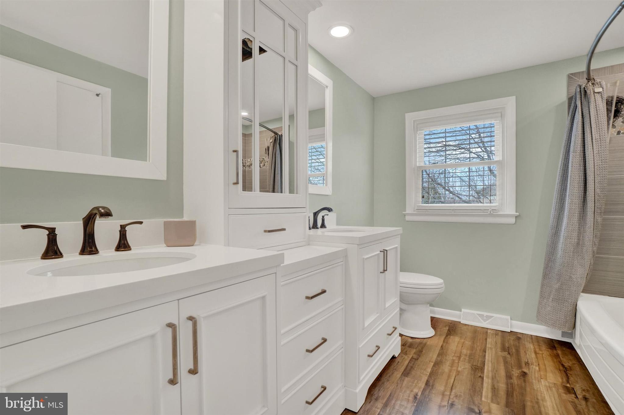 3460 Sycamore Road Dover, PA 17315 - Photo 16 of 28 a bathroom with a sink a toilet and a mirror