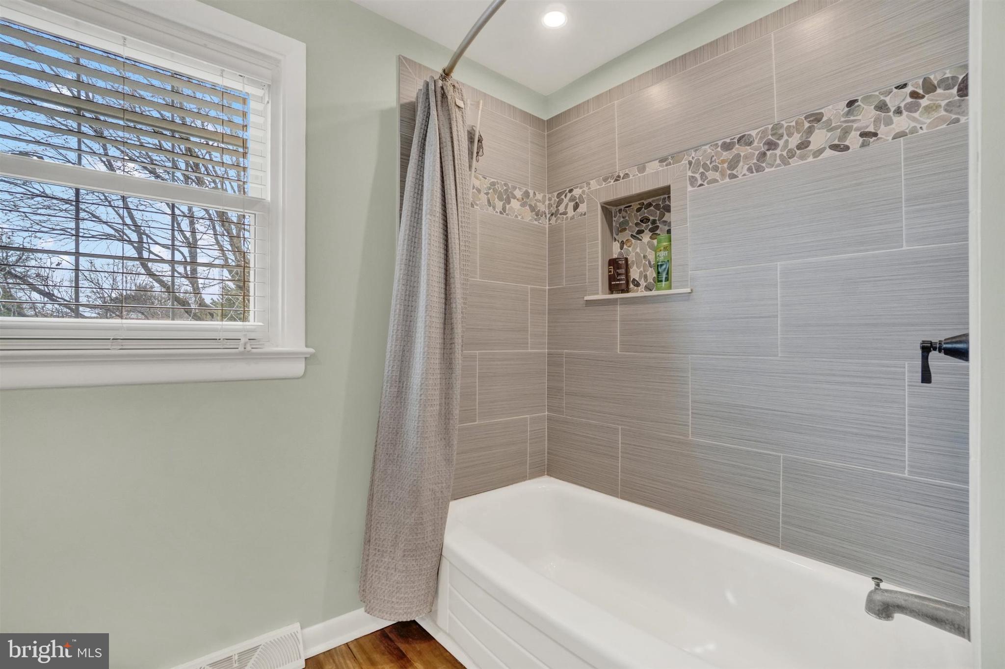 3460 Sycamore Road Dover, PA 17315 - Photo 17 of 28 a bathroom with a bathtub and shower