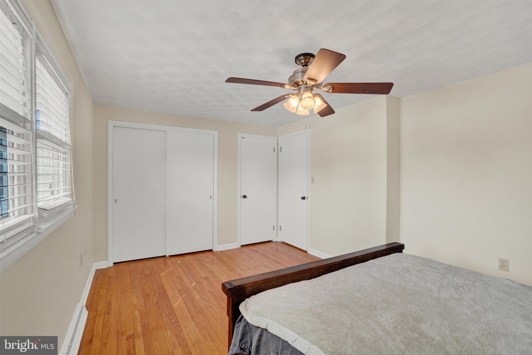 3460 Sycamore Road Dover, PA 17315 - Photo 19 of 28 a bedroom with a bed and a chandelier
