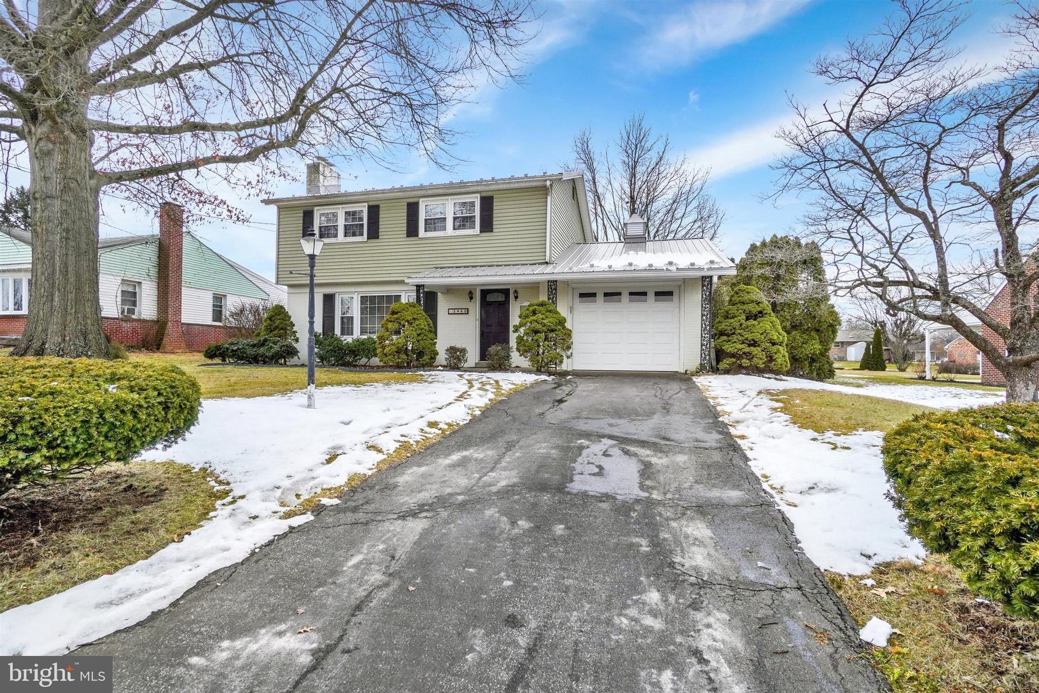 3460 Sycamore Road Dover, PA 17315 - Photo 2 of 28 a front view of a house with a yard and potted plants