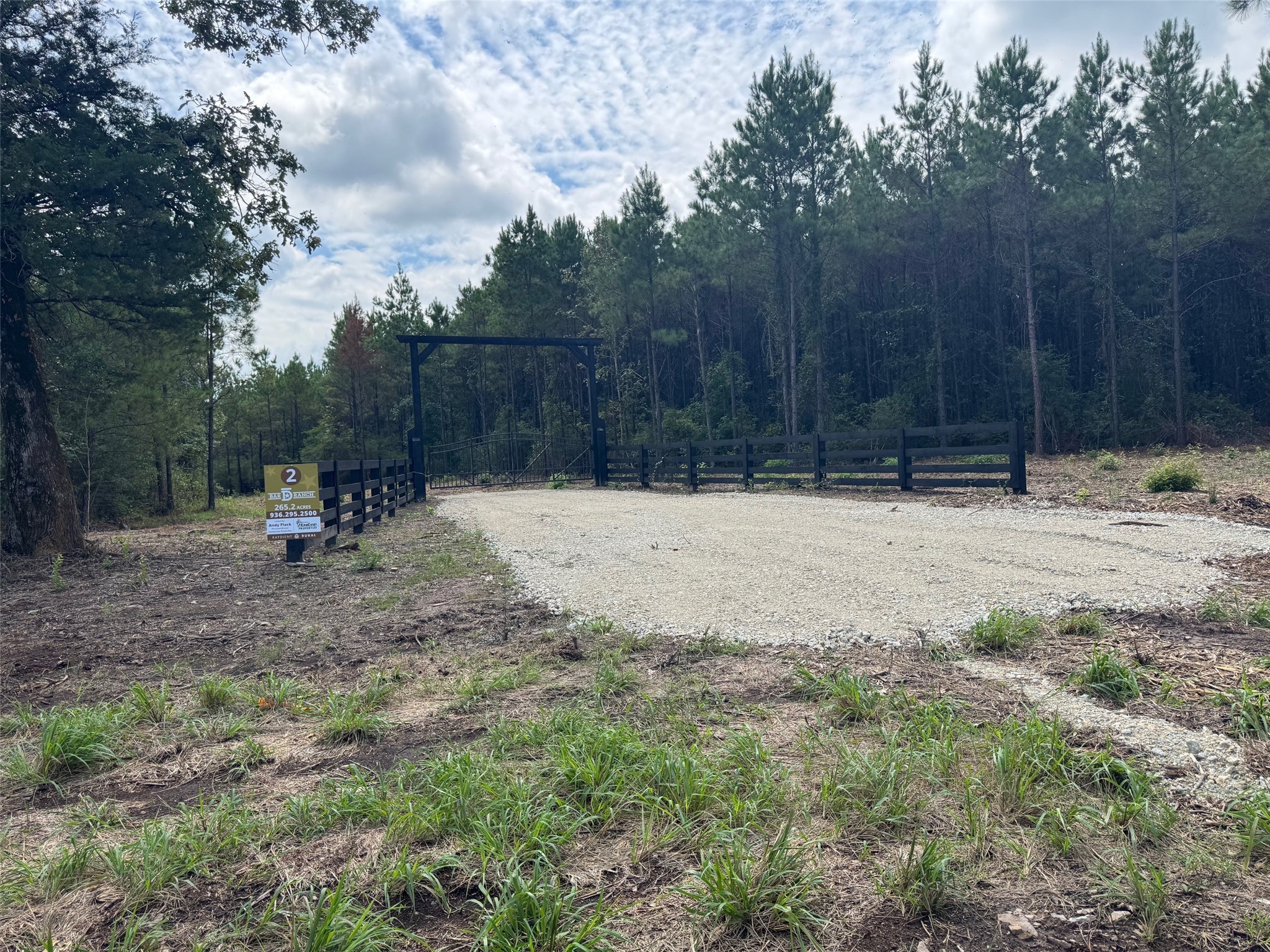 1 Fm 1987 Corrigan, TX 75939 - Photo 2 of 17 a backyard of a house with trees and wooden fence