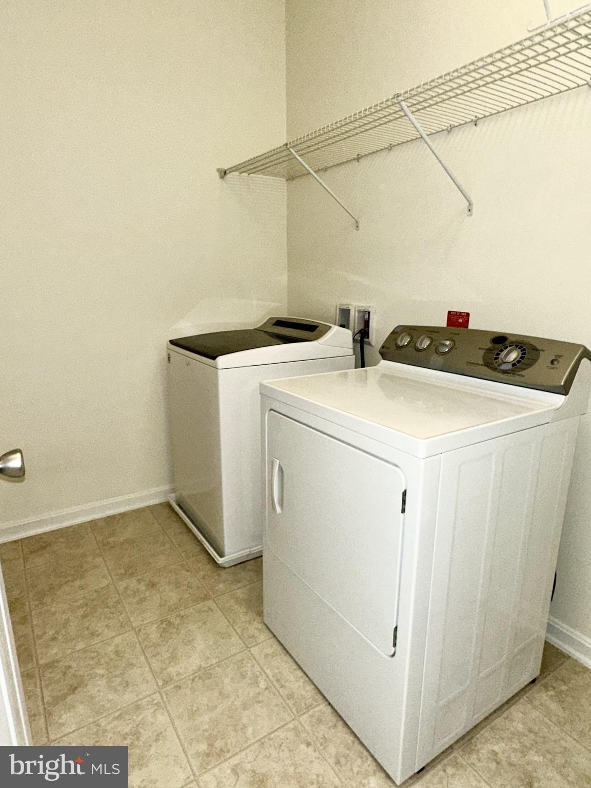 43903 Centergate Drive Ashburn, VA 20148 - Photo 24 of 26 Upper level laundry room for convenience