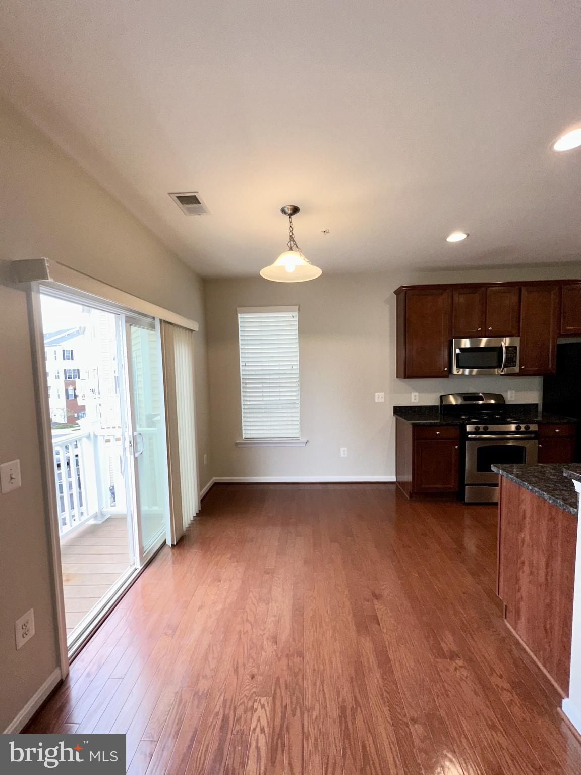 43903 Centergate Drive Ashburn, VA 20148 - Photo 9 of 26 Breakfast Nook with sliders to small deck