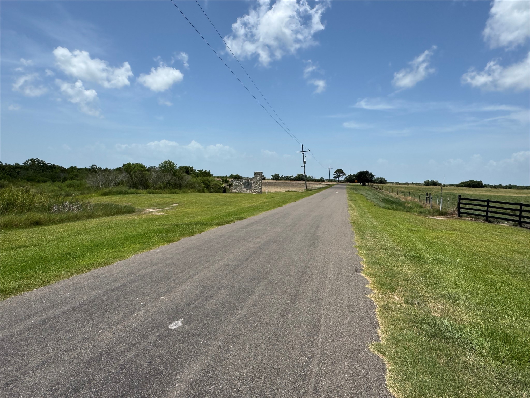 12-2 & 11 2 Smith Loop Anahuac, TX 77514 - Photo 5 of 10 a view of a golf course with a lake