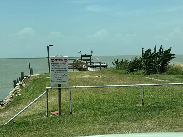 a view of a golf course with a lake