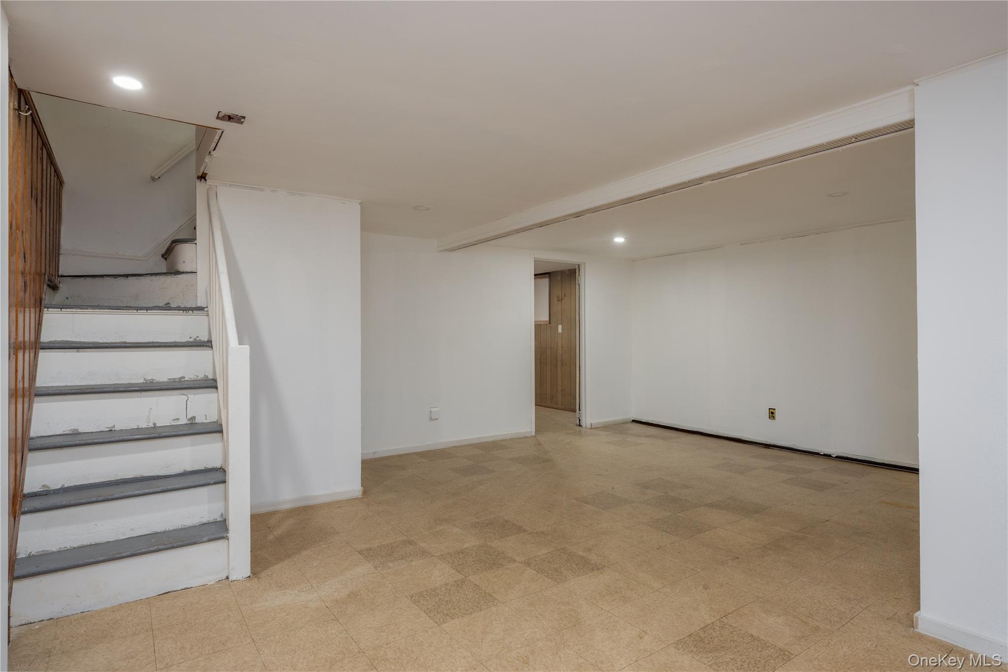 179-65 Selover Road Queens, NY 11434 - Photo 22 of 33 Family Room16'6" x 19'2"Finished basement