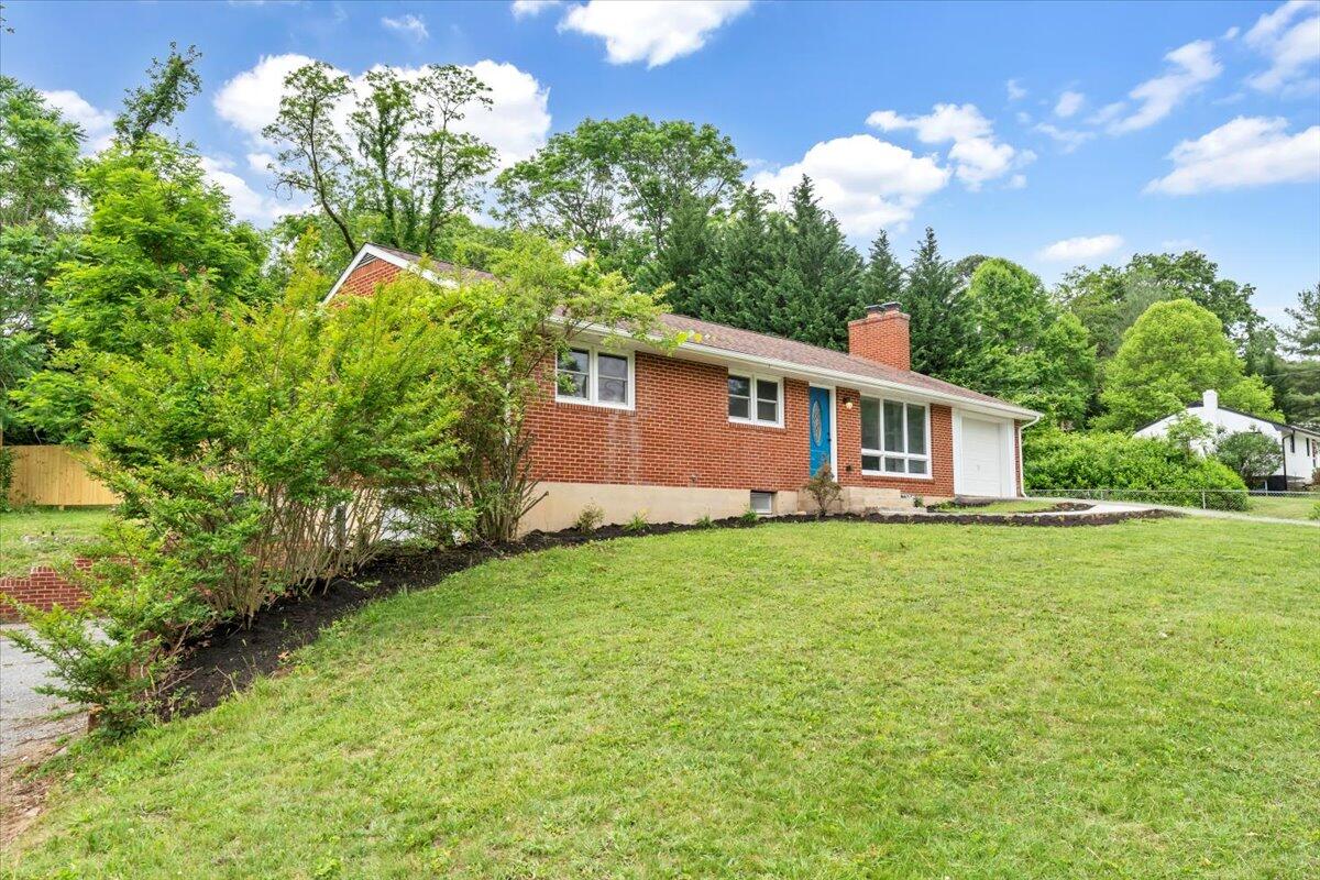 233 Oak Drive Blue Ridge, VA 24064 - Photo 35 of 37 a view of a house with backyard