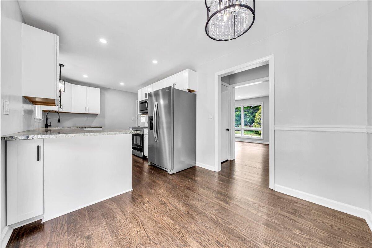 233 Oak Drive Blue Ridge, VA 24064 - Photo 8 of 37 a view of kitchen with furniture and stainless steel appliances