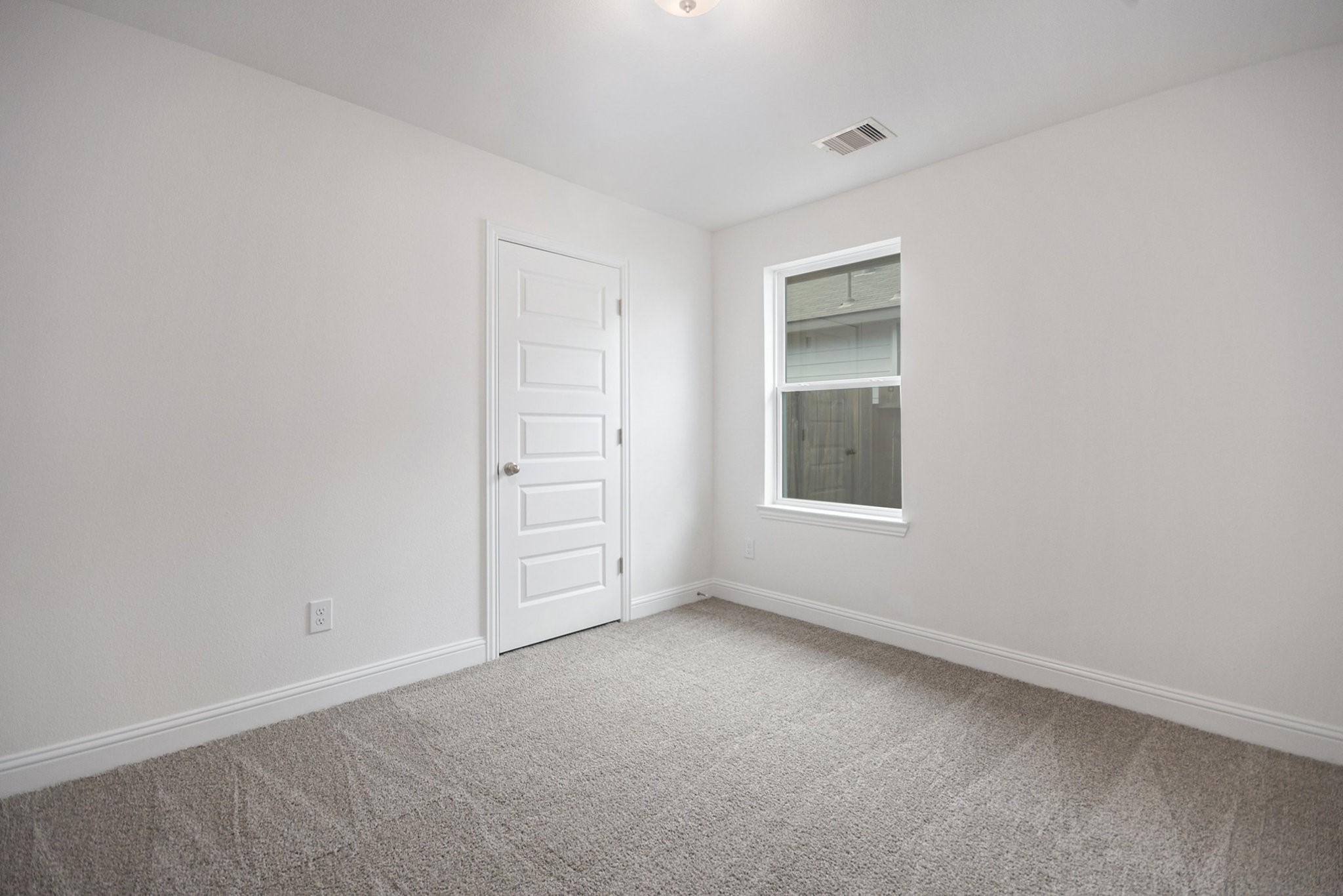 204 Bryan Way Angleton, TX 77515 - Photo 15 of 19 a view of an empty room with a window
