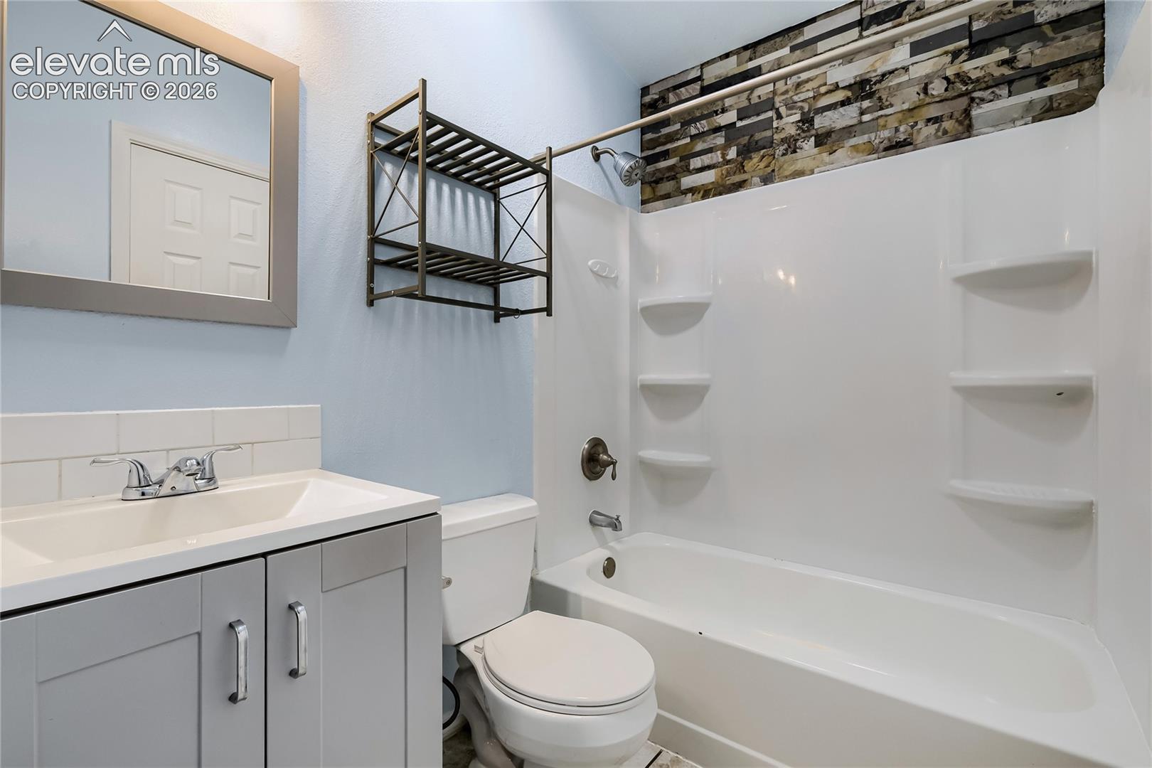 6375 Bismark Road Colorado Springs, CO 80922 - Photo 18 of 26 Upper Level Bathroom attached to primary bedroom