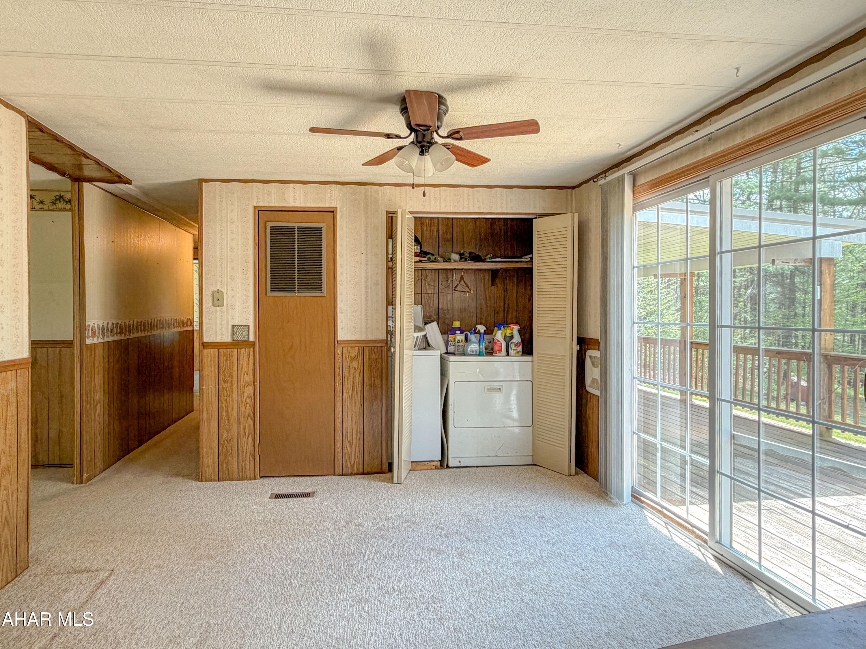 151 Pine Echo Road Everett, PA 15537 - Photo 26 of 51 a view of a livingroom with a ceiling fan & hallway