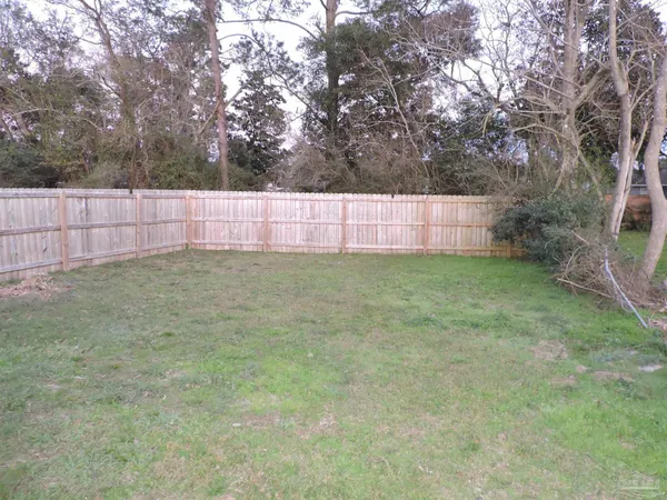 a view of yard with trees