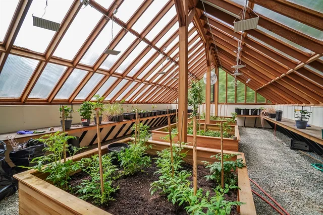a view of a backyard with sitting area