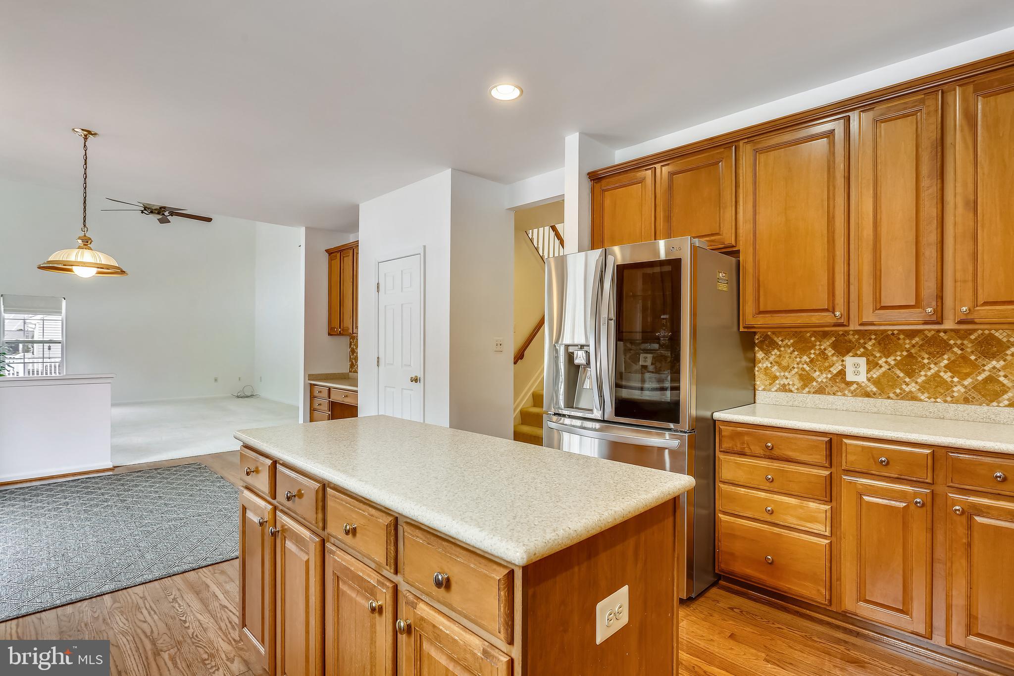 18519 Cornflower Road Boyds, MD 20841 - Photo 6 of 35 Center Island also with Corian Counters