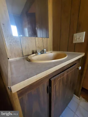 a bathroom with a toilet and a sink