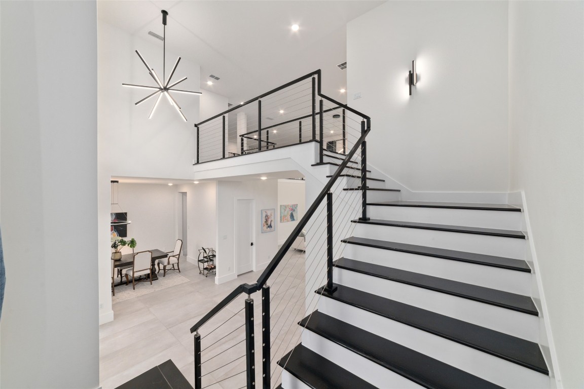 29627 Cir S Rnch Trail Fulshear, TX 77406 - Photo 12 of 50 Staircase that feels architectural, not just functional.