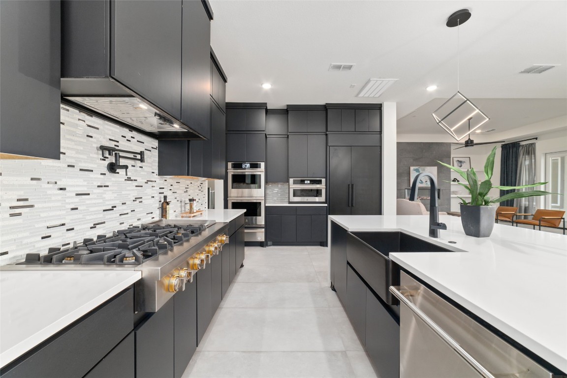 29627 Cir S Rnch Trail Fulshear, TX 77406 - Photo 16 of 50 Extended prep and serving space so hosting feels elevated and bespoke.