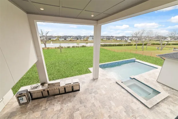 a view of a patio with a ocean view
