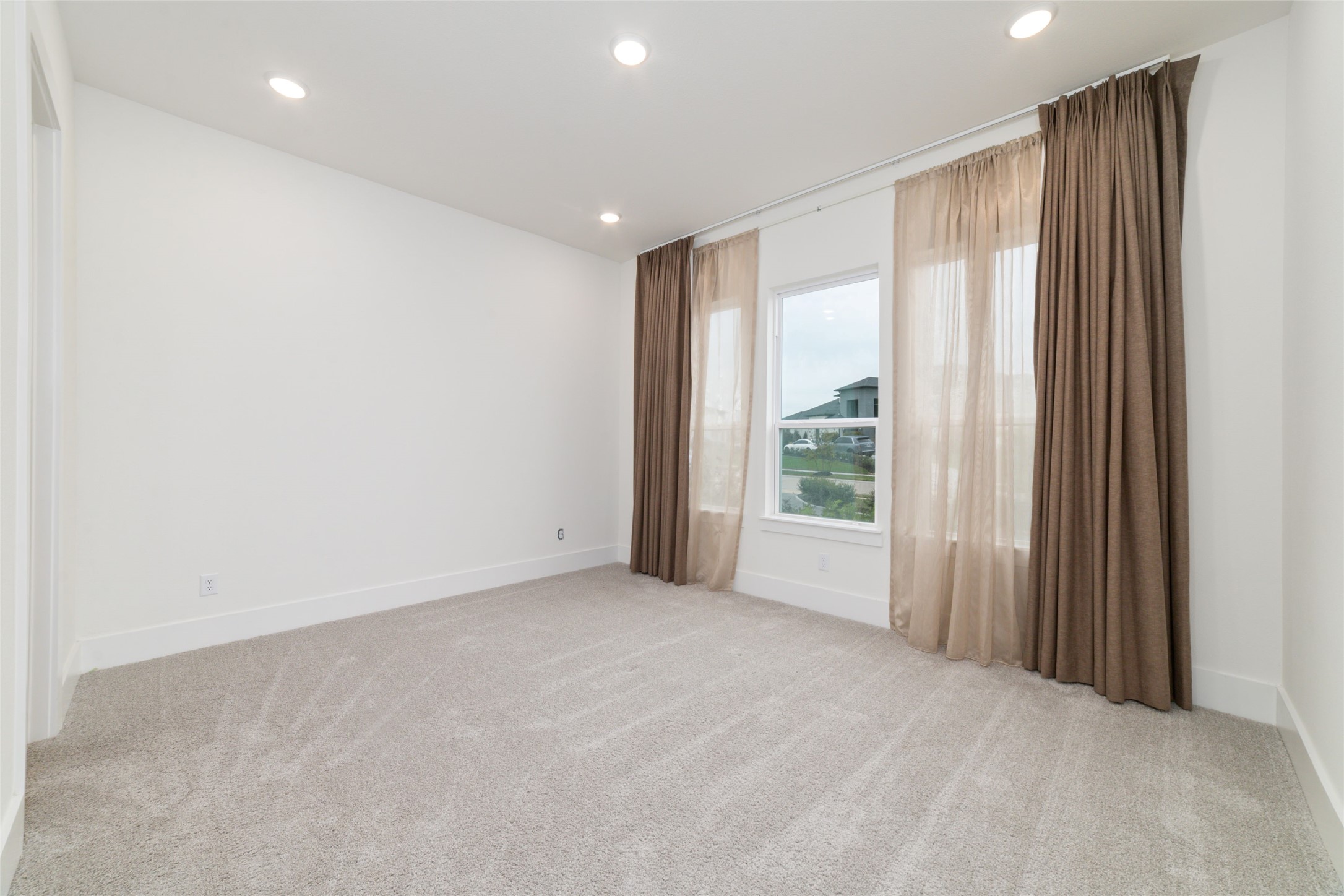 29627 Cir S Rnch Trail Fulshear, TX 77406 - Photo 29 of 50 a view of an empty room with a window