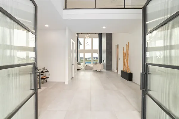 a large white room with a large window