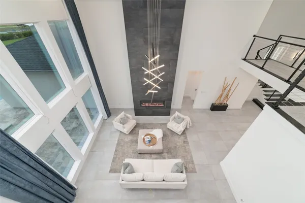 a view of living room with furniture and rug