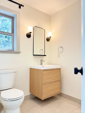 a view of a living room with a large window