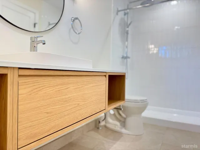 a view of front door with wooden floor