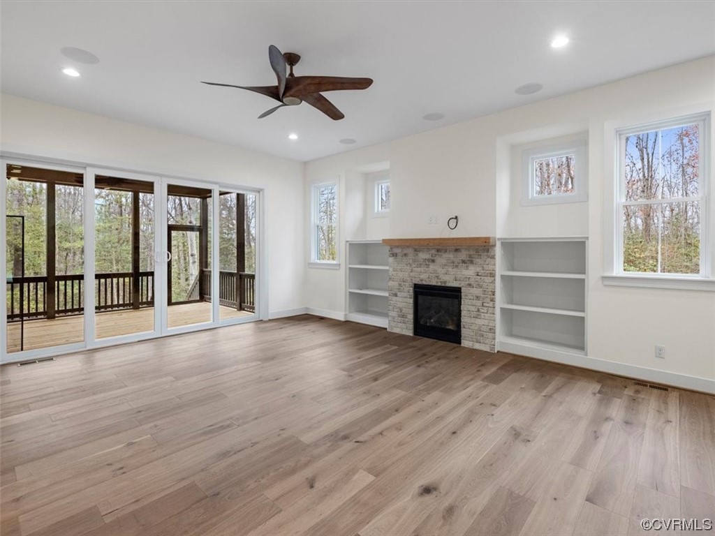 10712 River Fall Path Glen Allen, VA 23059 - Photo 4 of 28 a view of an empty room with a window and fireplace
